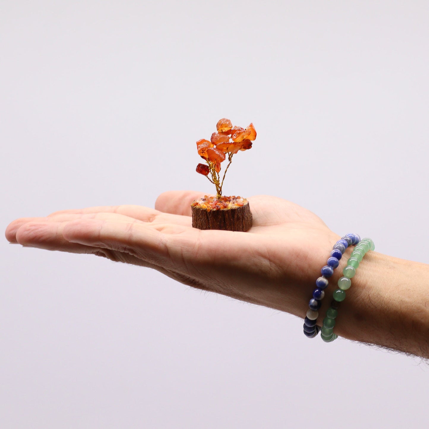 Mini Carnelian crystal tree on natural wood base – 6cm high with 15 healing crystals