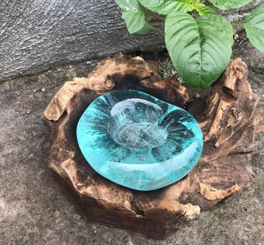 Hand-blown molten glass tea light holder on natural wood base – handmade in Bali