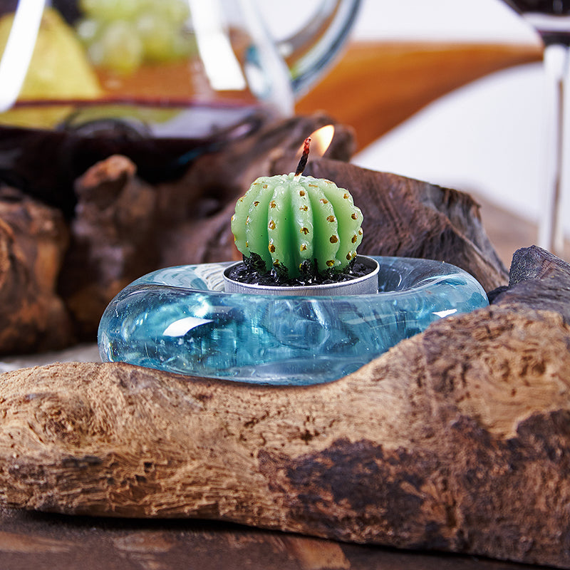 Hand-blown molten glass tea light holder on natural wood base – handmade in Bali