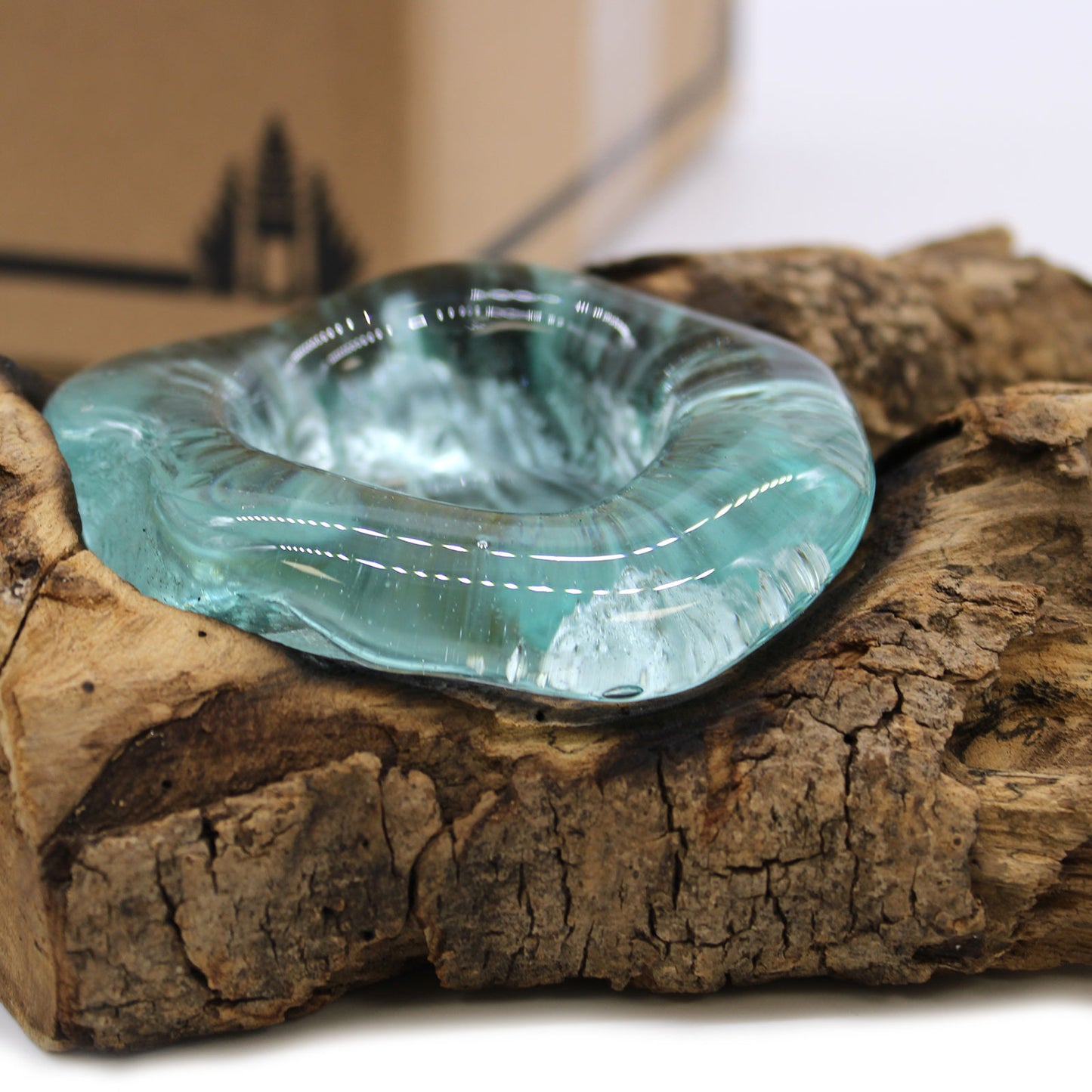 Hand-blown molten glass tea light holder on natural wood base – handmade in Bali