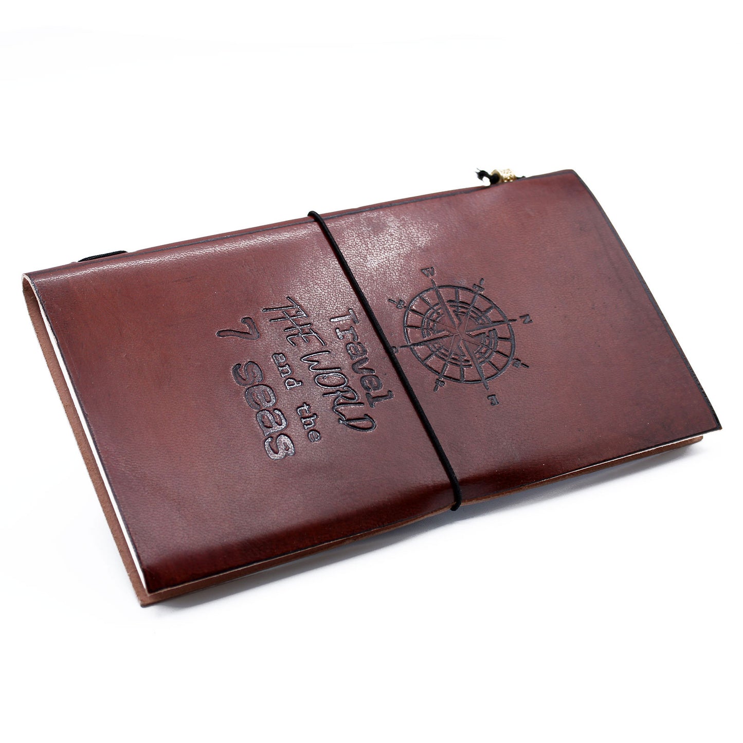 Brown handmade leather journal with embossed compass design and quote, wrap band closure.