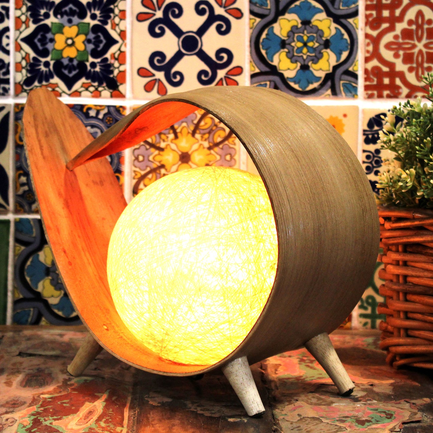 Natural coconut lamp with curved loop shape and cotton twine shade, handcrafted in Bali