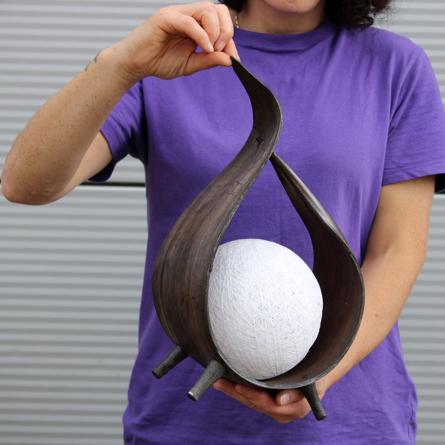 Natural Coconut Leaf Lamp in chocolate wrapover twist design with cotton ball shade and four wooden legs