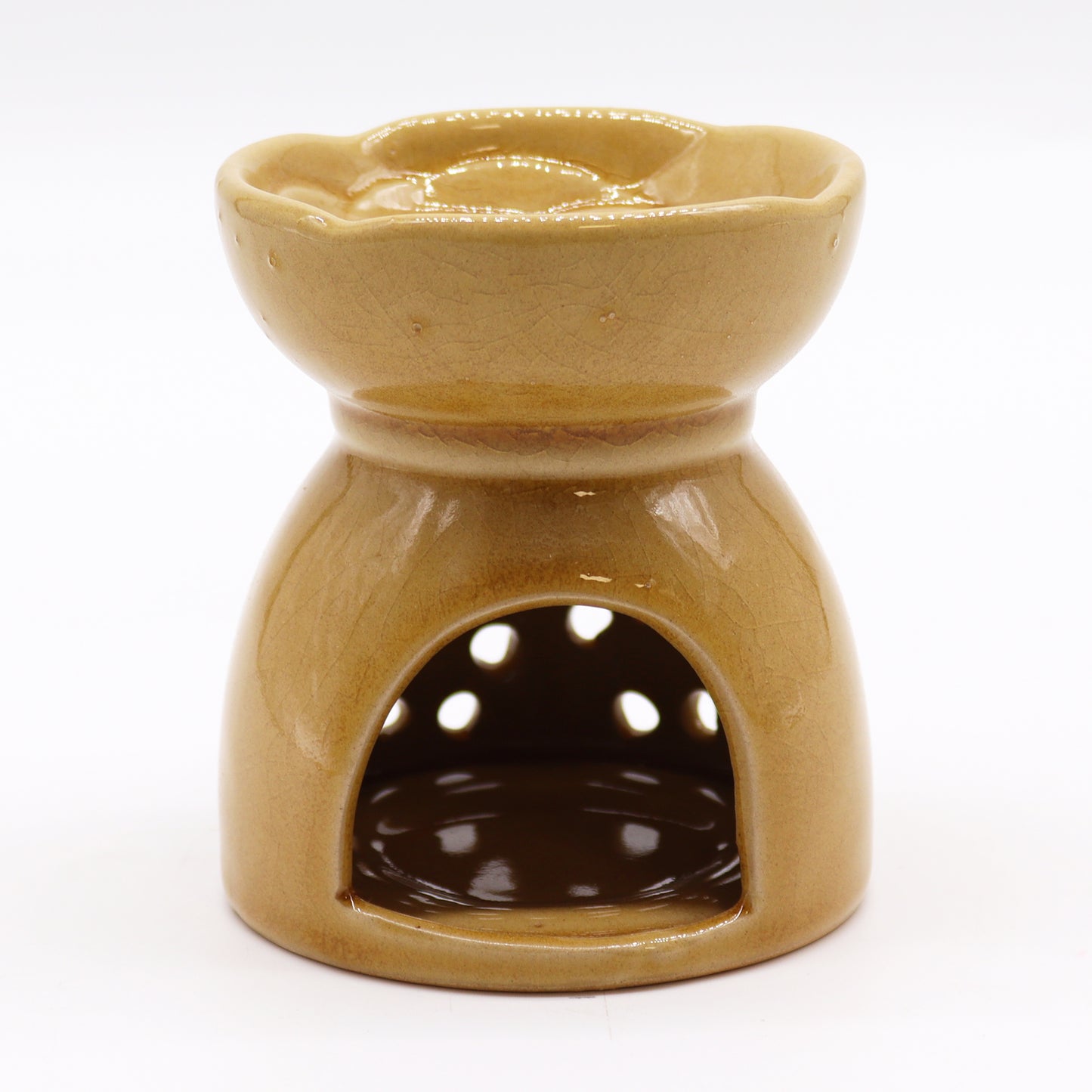honey-coloured ceramic oil burner with tealight holder and decorative cutouts