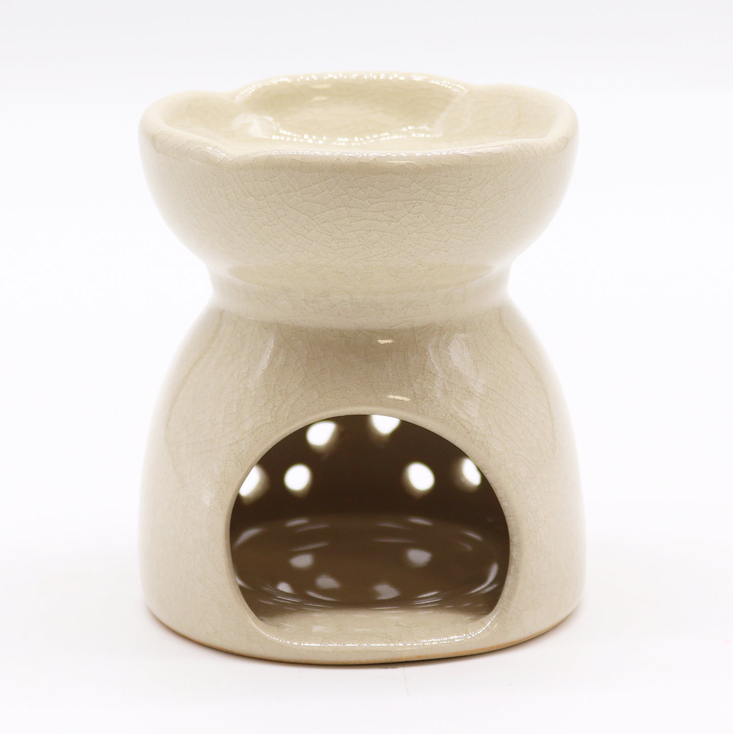 Ivory ceramic oil burner with Tree of Life cutouts