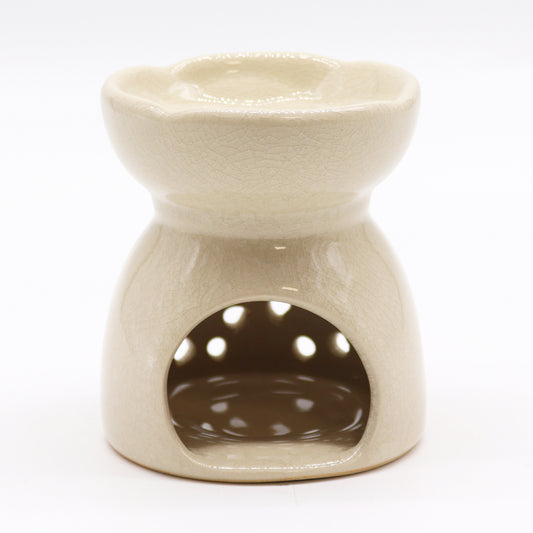 Ivory ceramic oil burner with Tree of Life cutouts