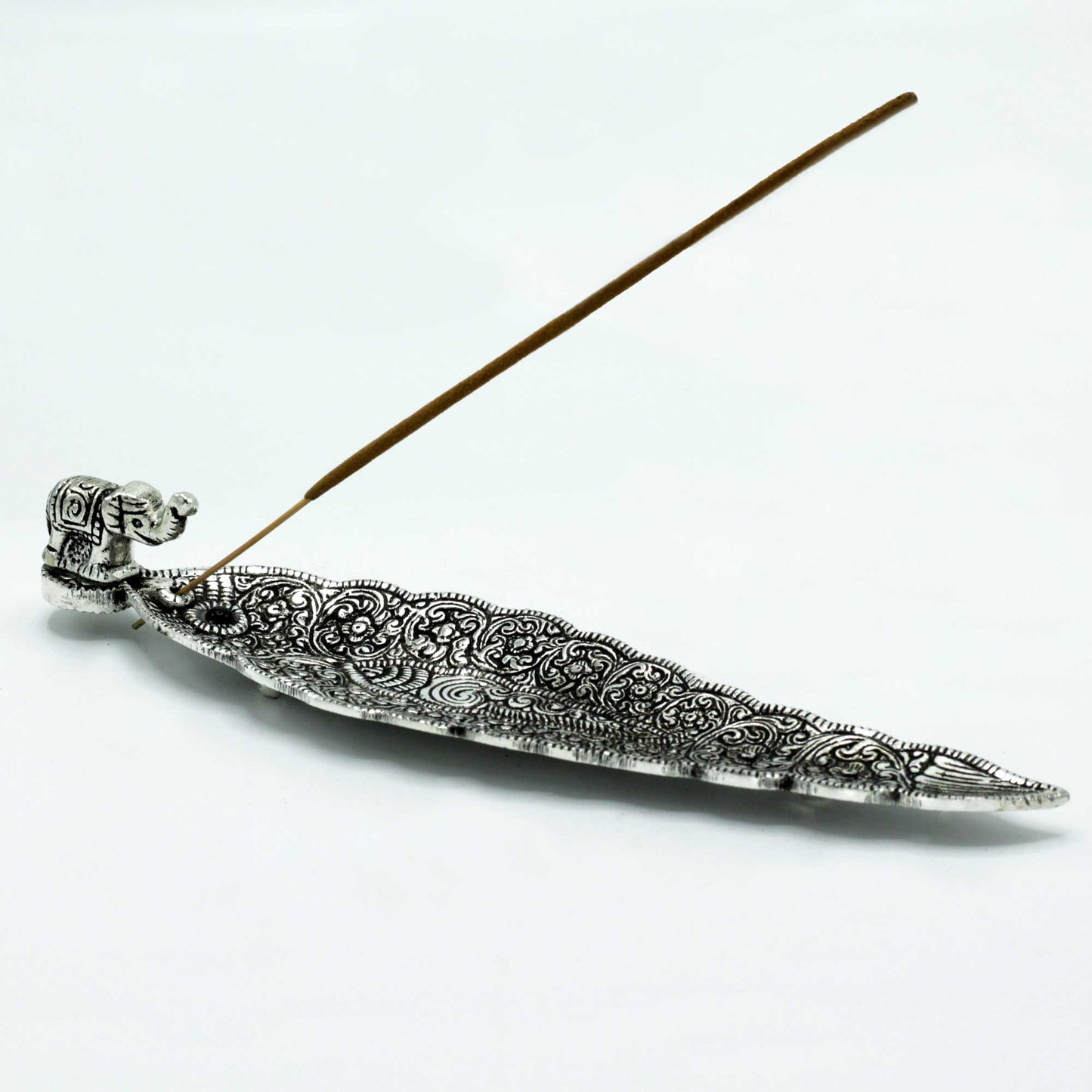 Polished aluminium incense holder with detailed etching and elephant figurine. 20cm long tray design for stick incense, symbolising wisdom and good fortune.