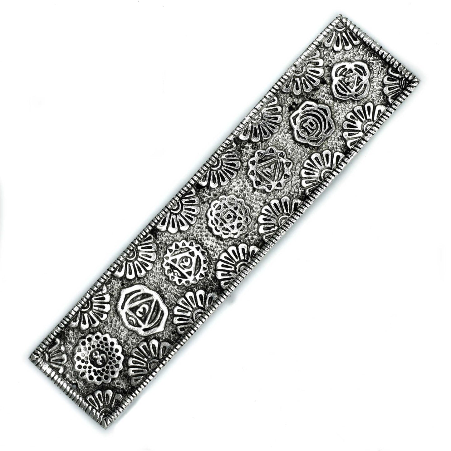 Polished aluminium incense holder with engraved chakra symbols and floral mandala patterns. 23cm long, ideal for stick incense and chakra-themed décor.