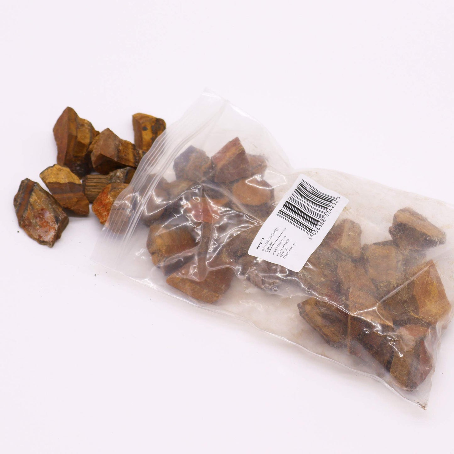 Raw Tiger’s Eye crystal – golden brown rough stone for strength and grounding