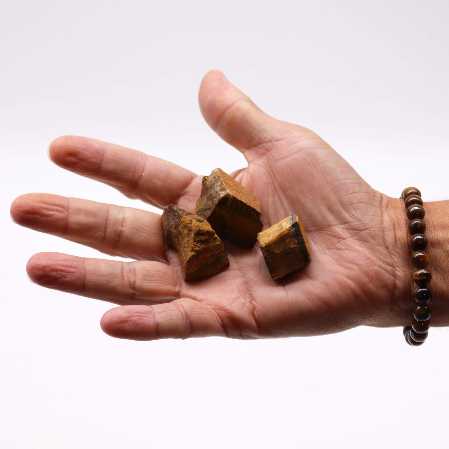 Raw Tiger’s Eye crystal – golden brown rough stone for strength and grounding