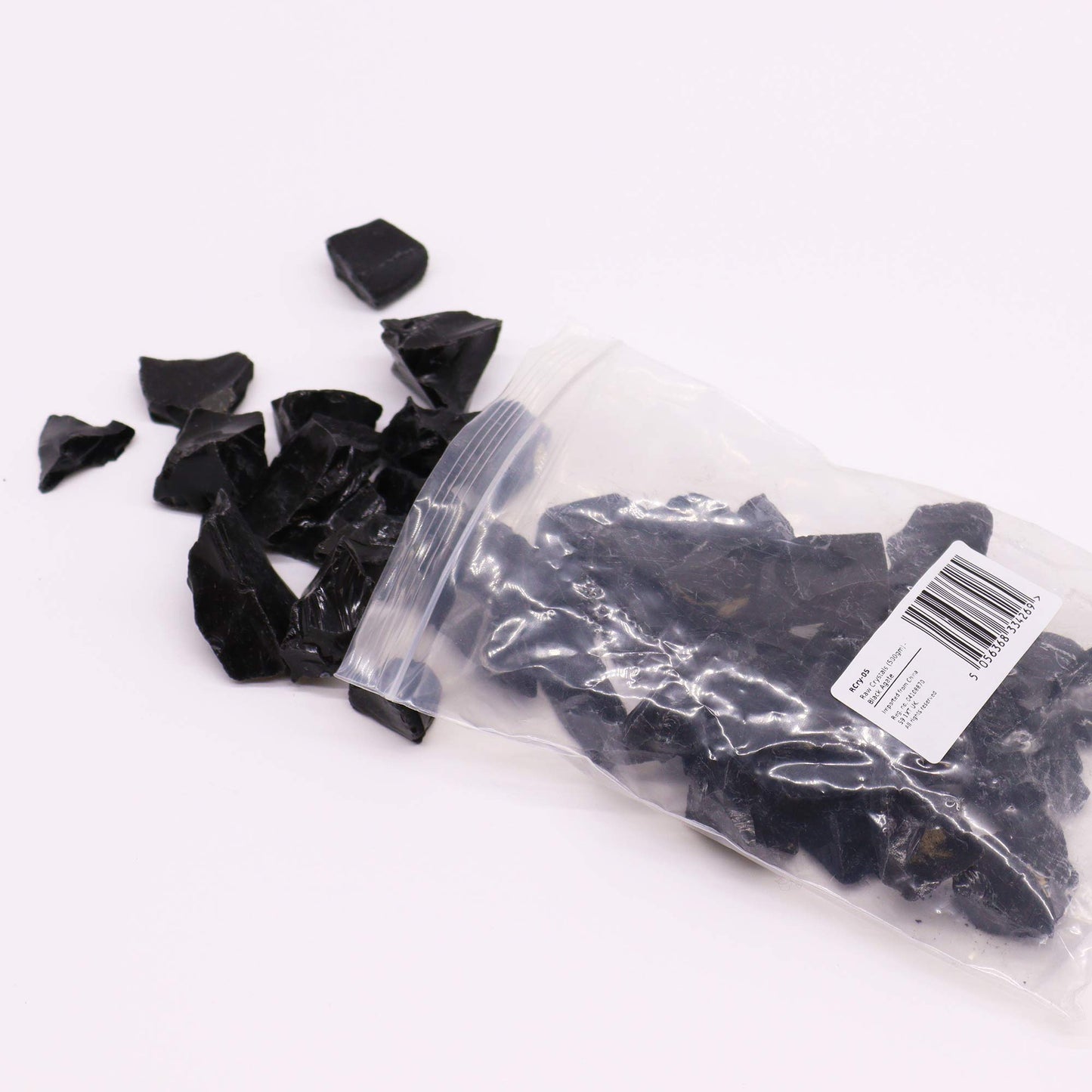 Raw Black Agate crystal – dark rough stone for grounding and protection
