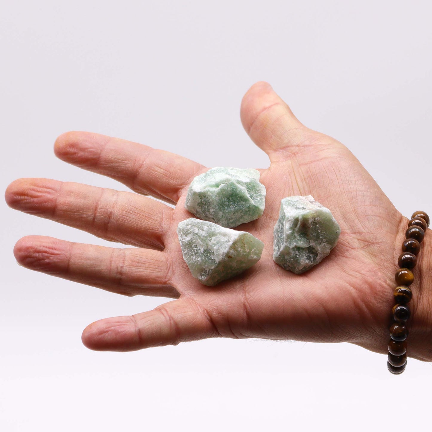 Raw Crystal Jade – soft green rough stone for peace and prosperity