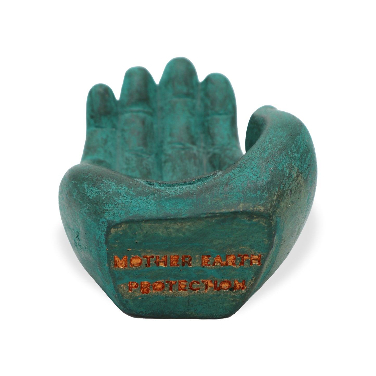 Green stone incense holder shaped like a hand with engraved tribal symbol and “Mother Earth Protection” text.