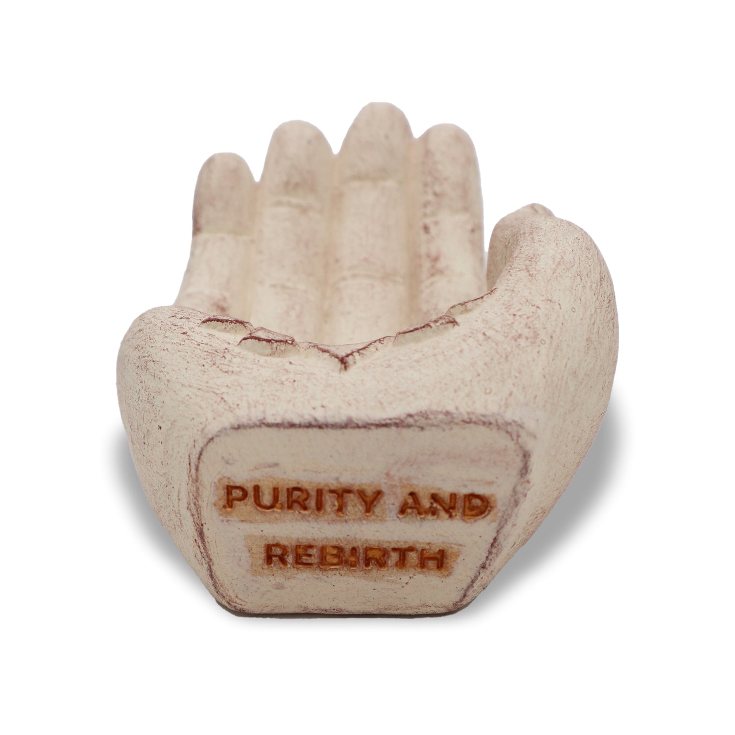 White stone incense holder shaped like a hand with a carved lotus flower and “Purity and Rebirth” engraving.