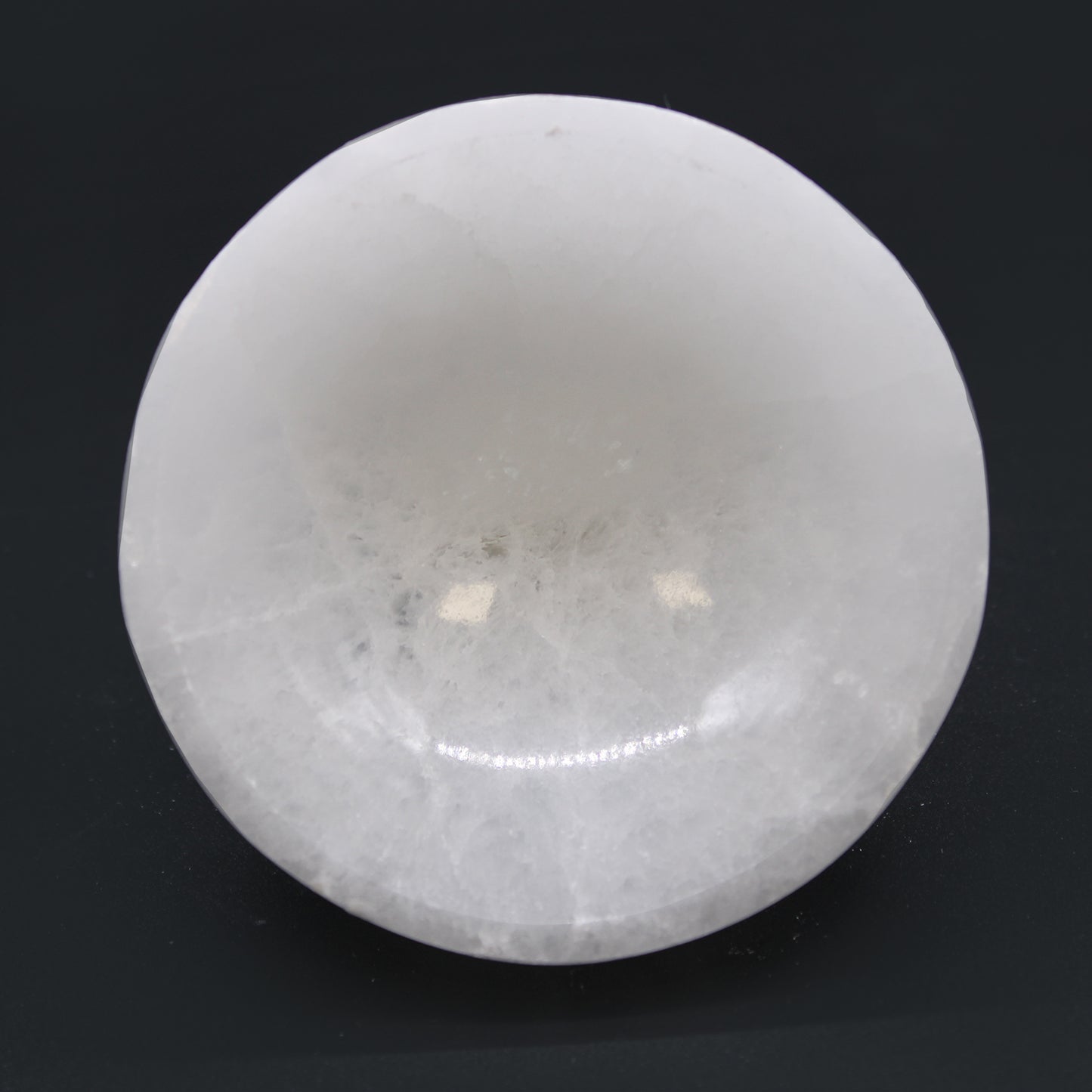 Selenite Round Bowl – 10cm, smooth hand-carved Moroccan bowl with moonlike glow