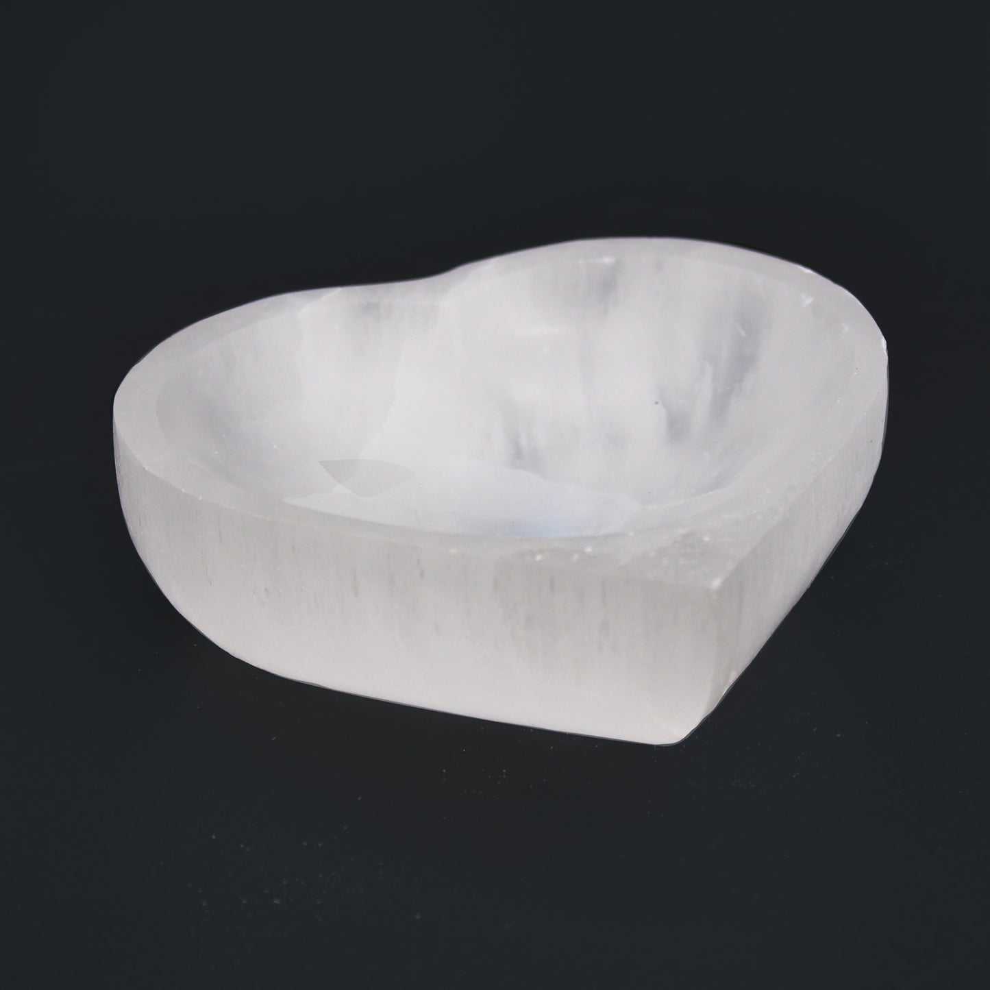 Selenite Heart Bowl – 10cm, moonlit Moroccan selenite in a carved heart shape