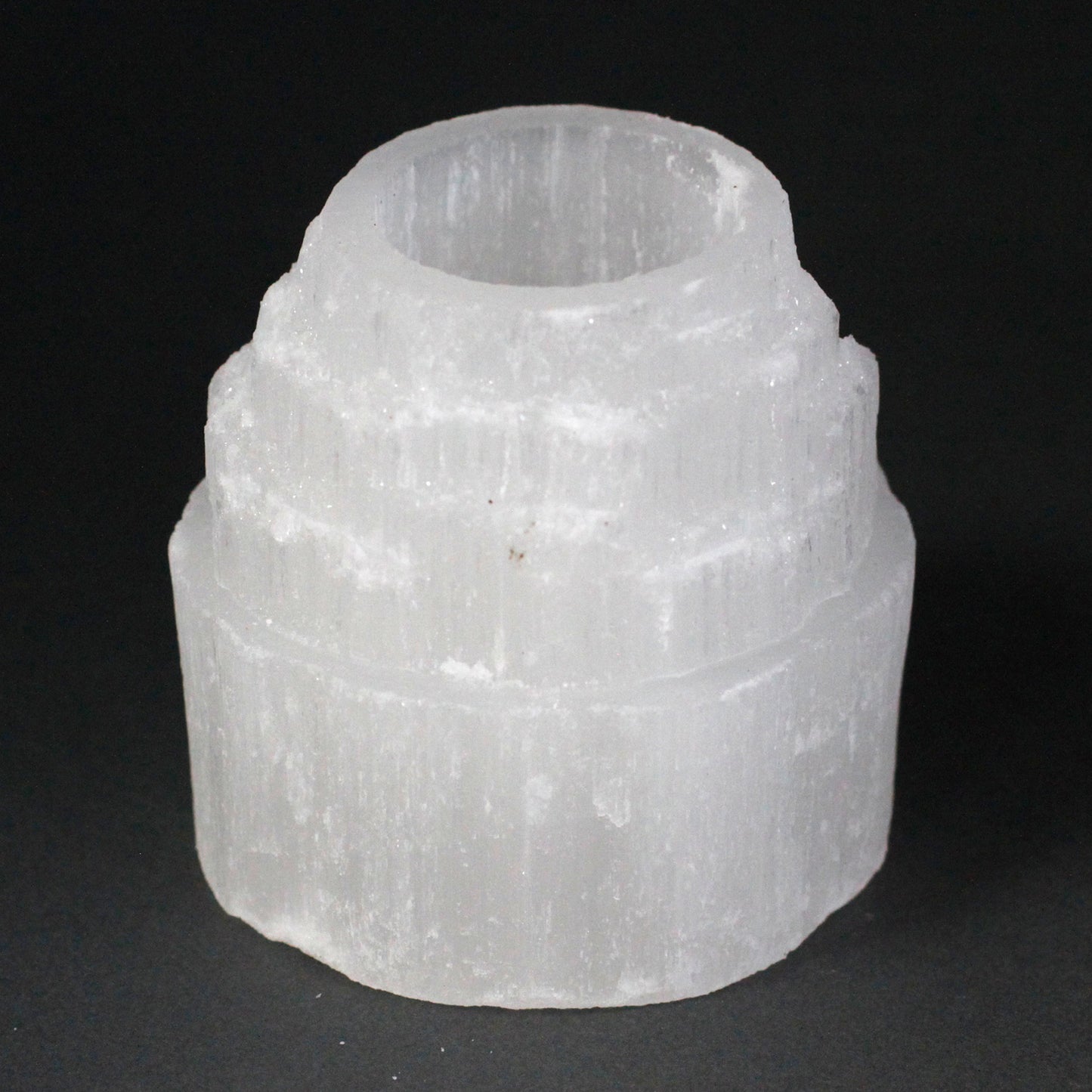 Selenite Mountain Top Candle Holder – 8cm round crystal tea light holder with glowing translucent sides
