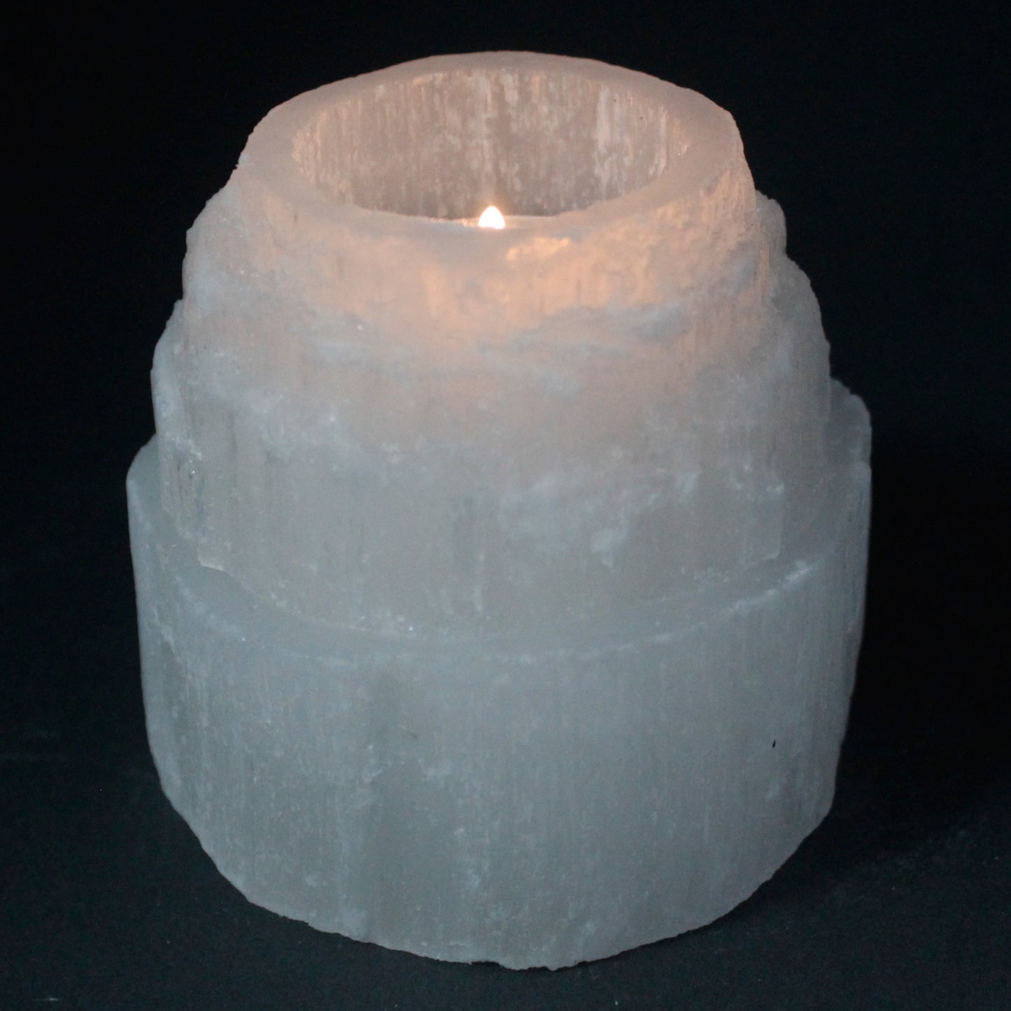 Selenite Mountain Top Candle Holder – 8cm round crystal tea light holder with glowing translucent sides