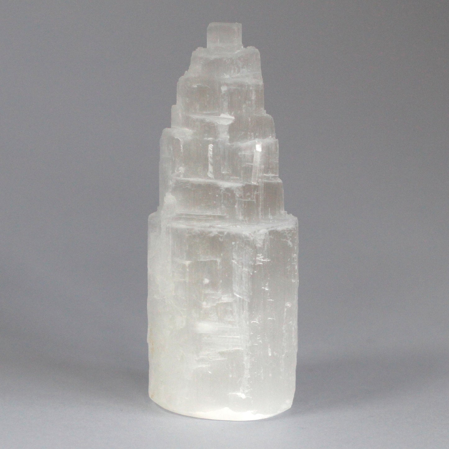 10cm Natural Selenite Tower with lunar glow, ethically sourced from Morocco