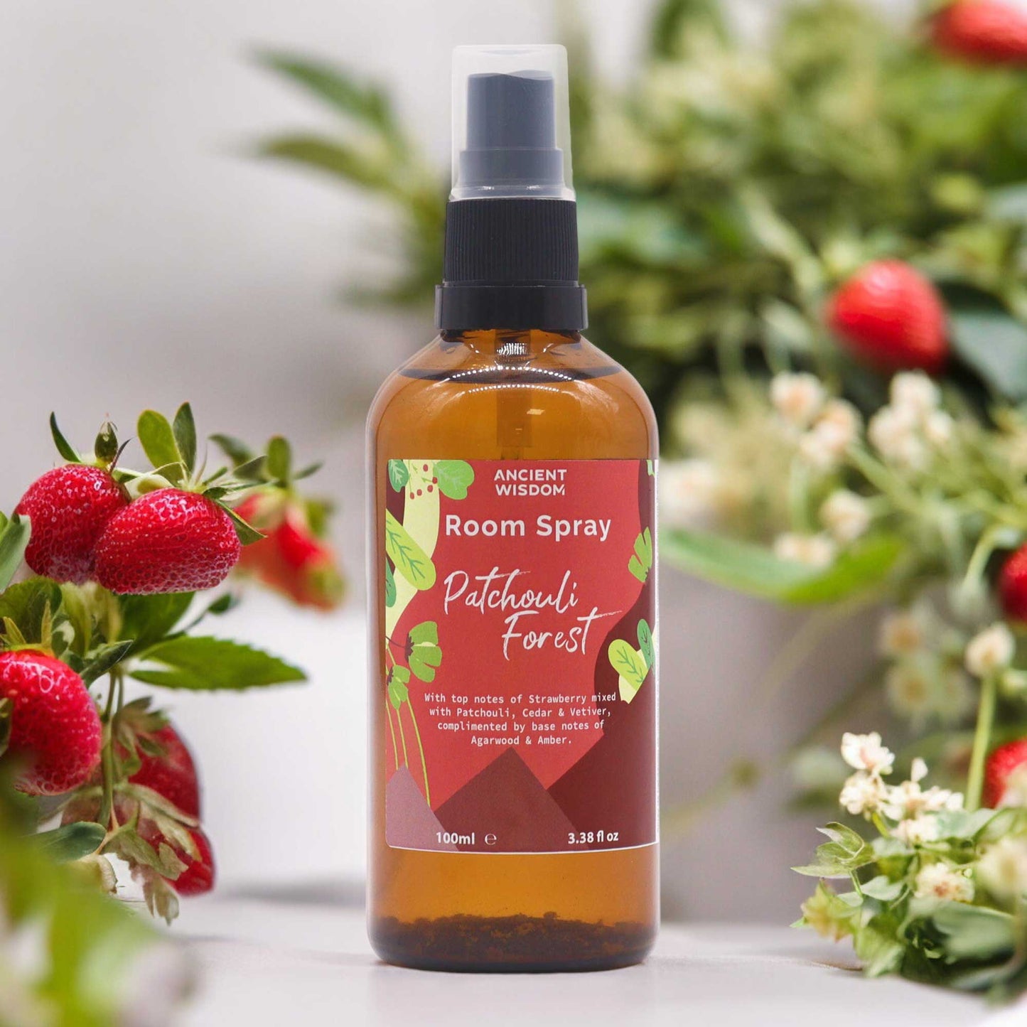 Amber glass room spray bottle labelled Patchouli Forest, Summer Home collection – 100ml