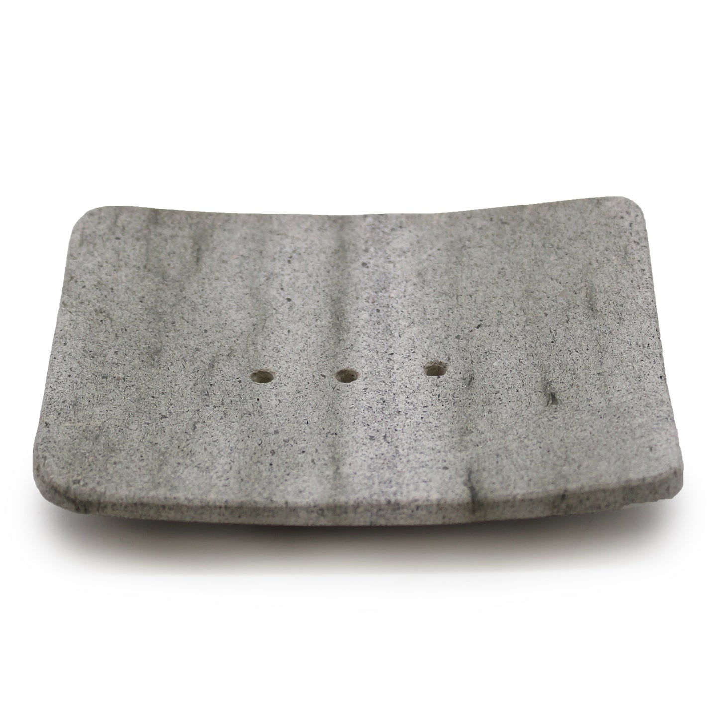Square grey zeolite stone soap dish with drainage holes, minimalist and handcrafted.