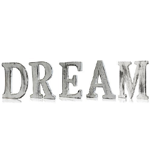 Whitewashed wooden letters spelling "DREAM", handcrafted from mango wood in shabby chic style