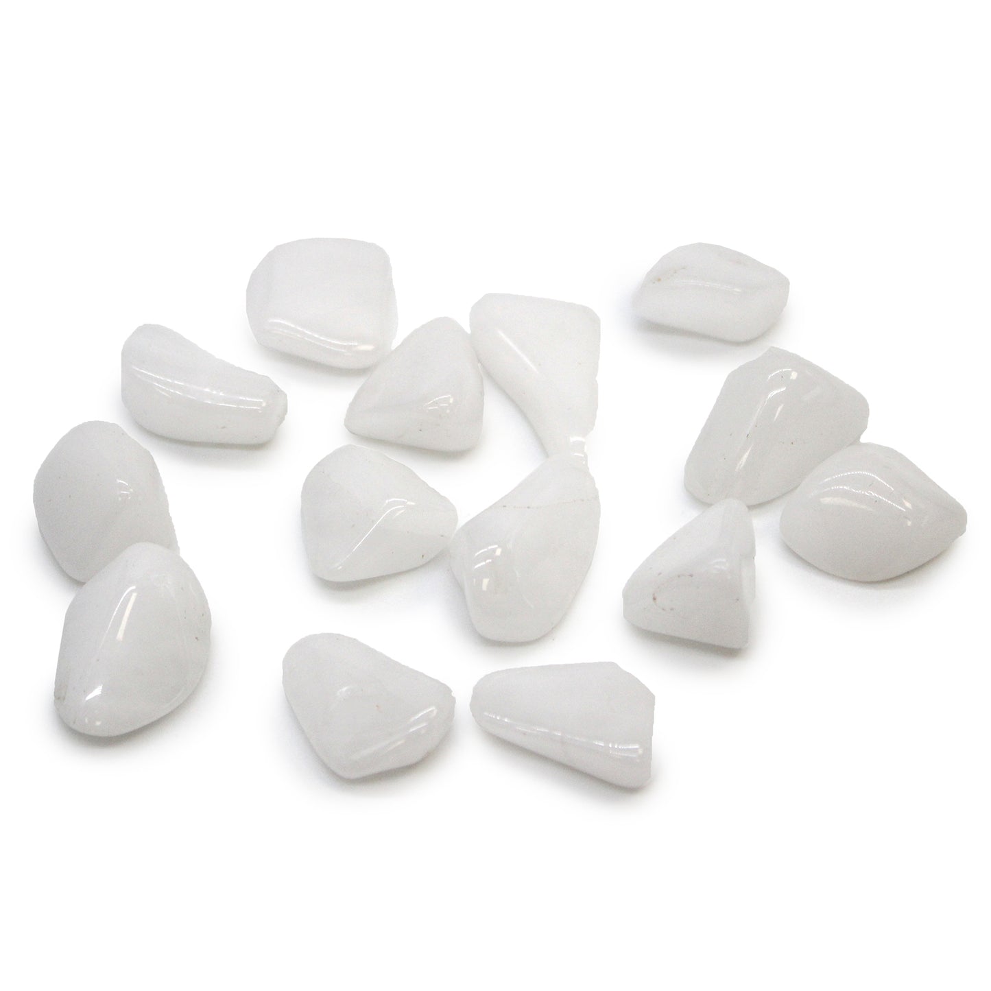Polished Snow Quartz tumbled stones (10–25 mm), soft white and calming, symbolising purity, patience, and gentle mental clarity.