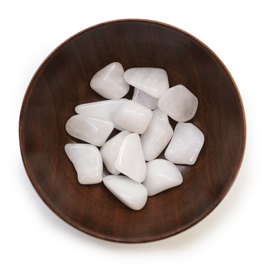 Polished Snow Quartz tumbled stones (10–25 mm), soft white and calming, symbolising purity, patience, and gentle mental clarity.