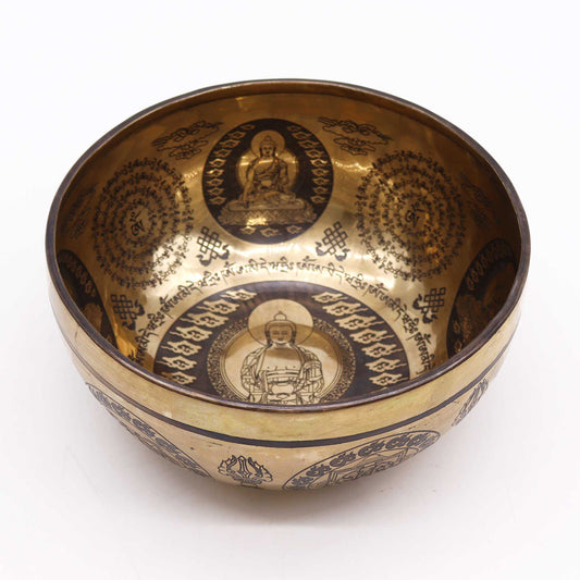 Tibetan singing bowl with engraved Five Buddhas and sacred symbols – 21cm, handcrafted for meditation and healing.
