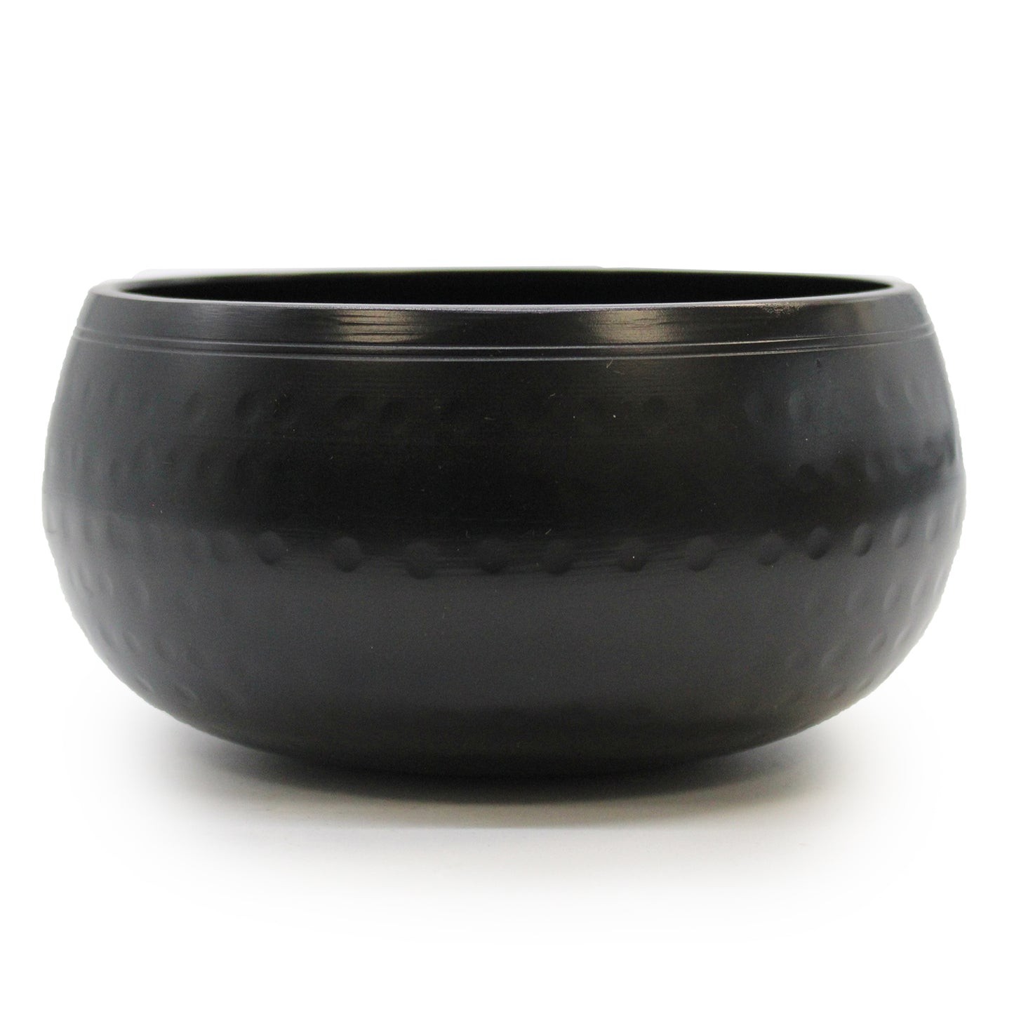 Medium Black Beaten Singing Bowl. Handcrafted from brass in India, black colour with hand beaten dimples all around the outside.