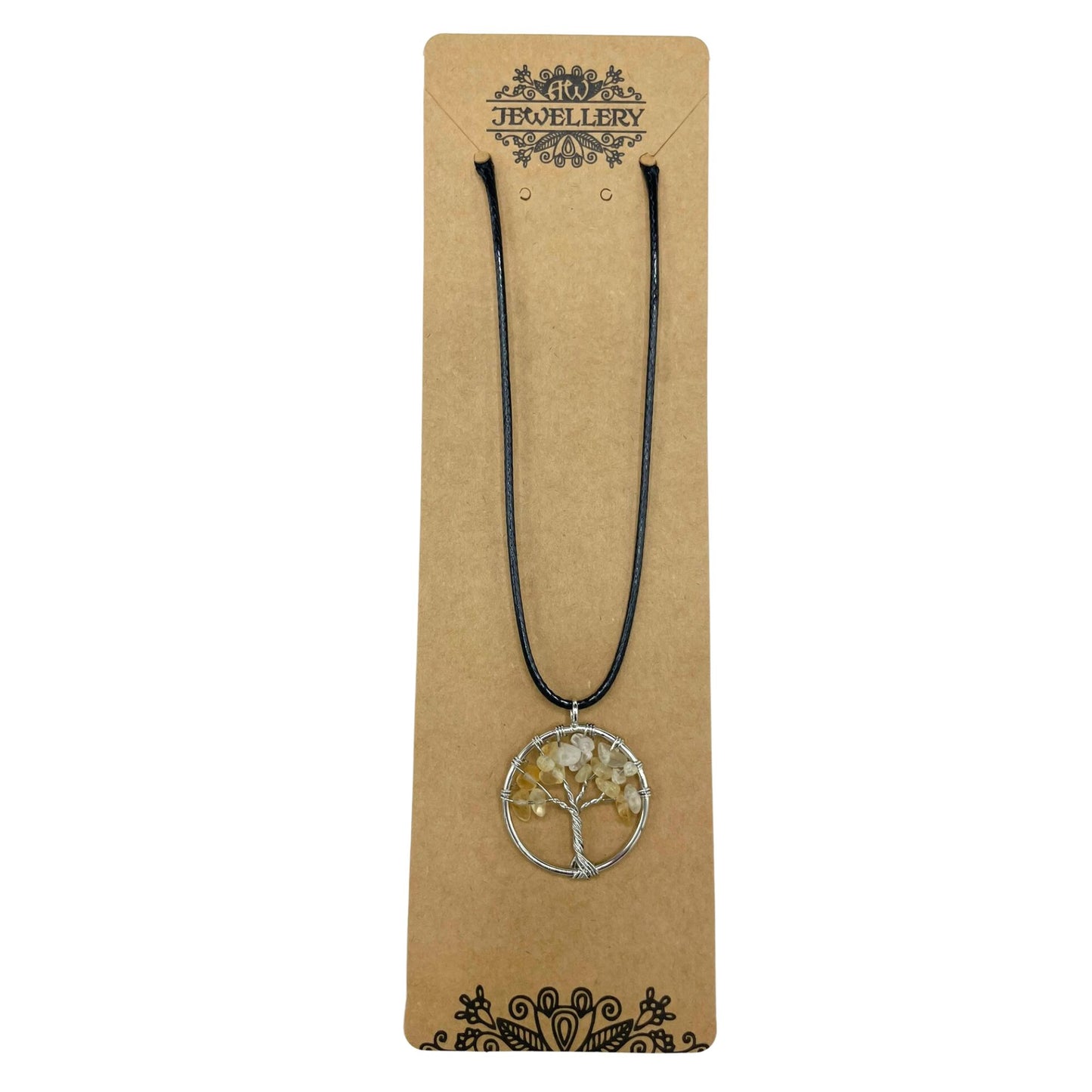 "Tree of Life Pendant featuring a glowing orange Carnelian gemstone, delicately wire-wrapped in silver, suspended on a black cord."