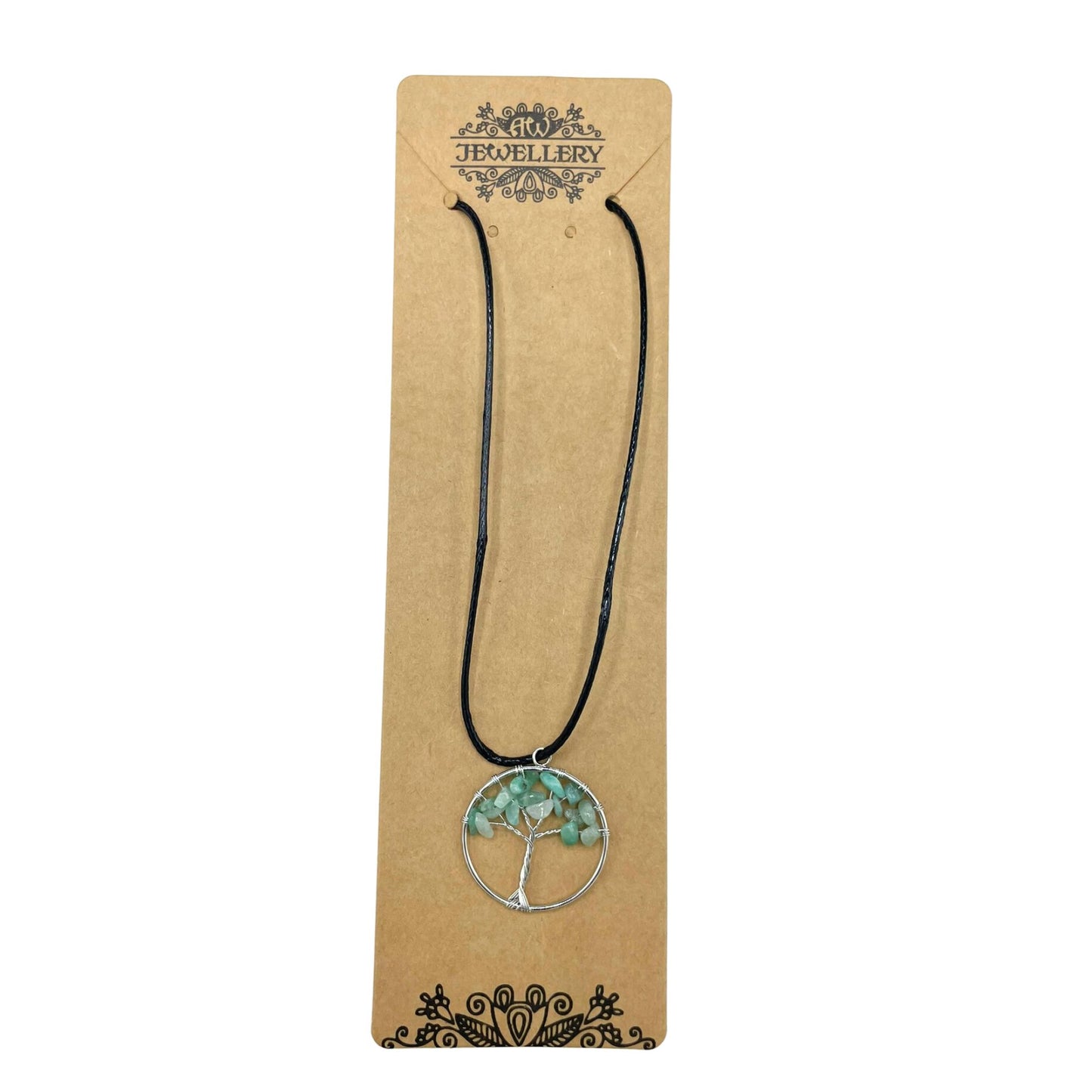 "Tree of Life Pendant with soothing green Jade gemstone and silver wire-wrapped design, hanging on a black cord."