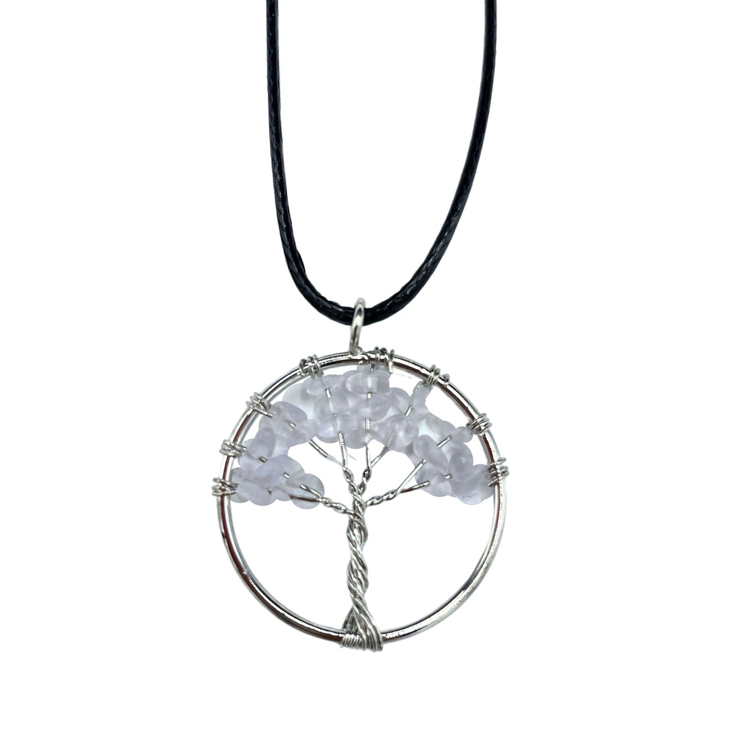 "Tree of Life Pendant with clear Rock Crystal gemstone, silver wire-wrapped design on a black cord necklace."