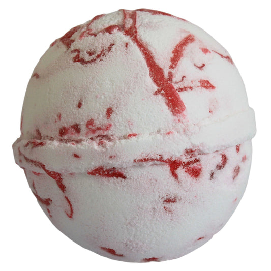 Tropical Paradise bath bomb with strawberry scent, coconut butter, and colourful soap peelings for a sweet, foaming soak.
