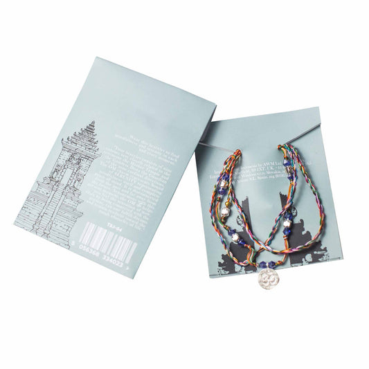 Multi-coloured Temple String Bracelet with silver Om charm symbolizing serenity, mindfulness, and presence.