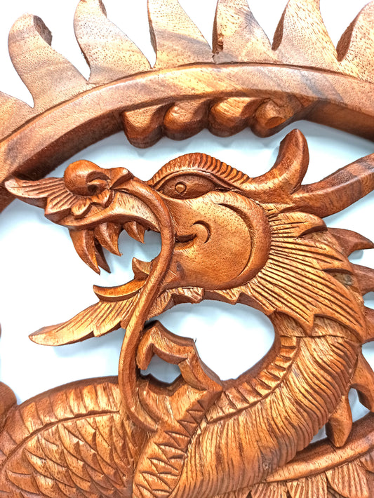 Hand-carved Suar wood Dragon wall panel with sunburst frame (40cm)