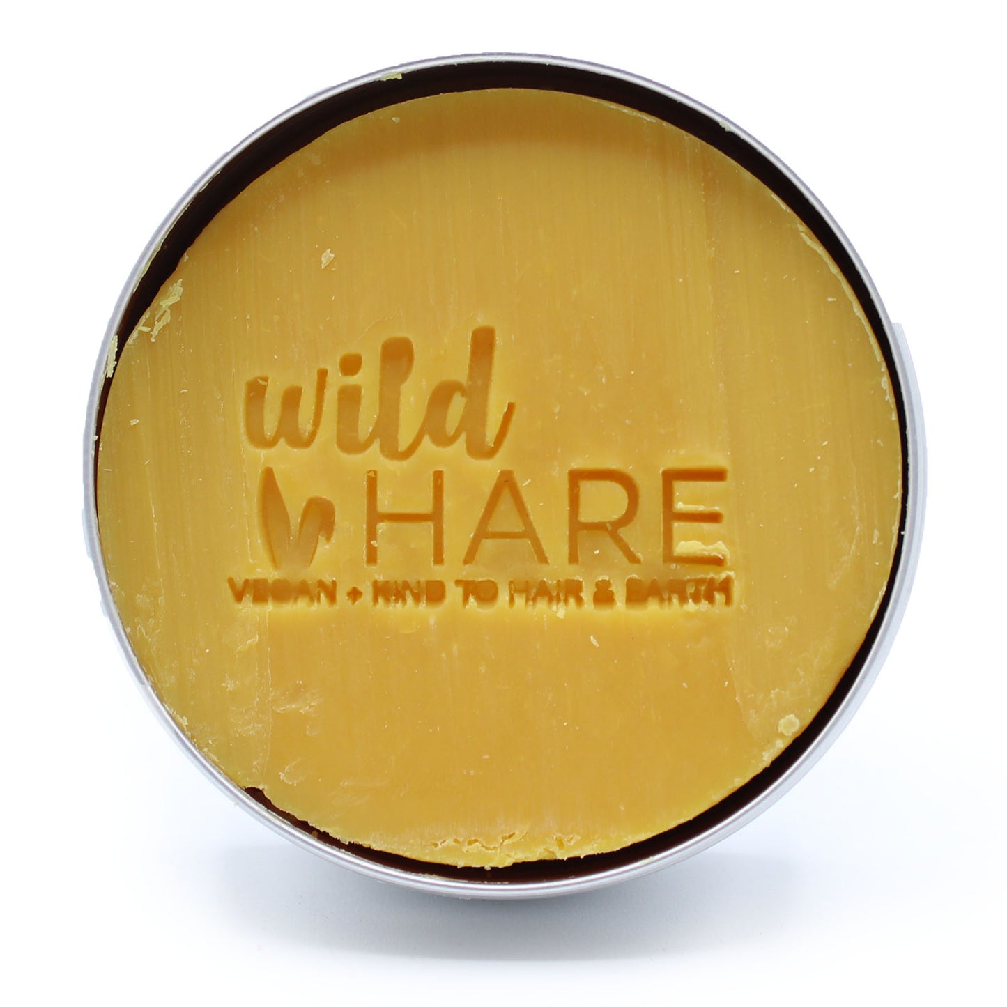 Solid shampoo bar for curly hair with papaya scent and coconut oil, vegan and SLS-free, in a 60g travel-friendly tin for curl hydration and frizz control
