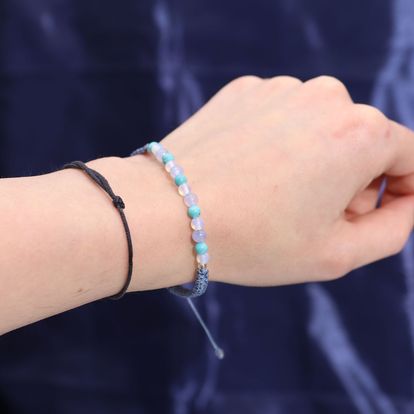Pisces Zodiac Crystal Candle with gemstone bracelet, blue jar with constellation and pyrite crystals