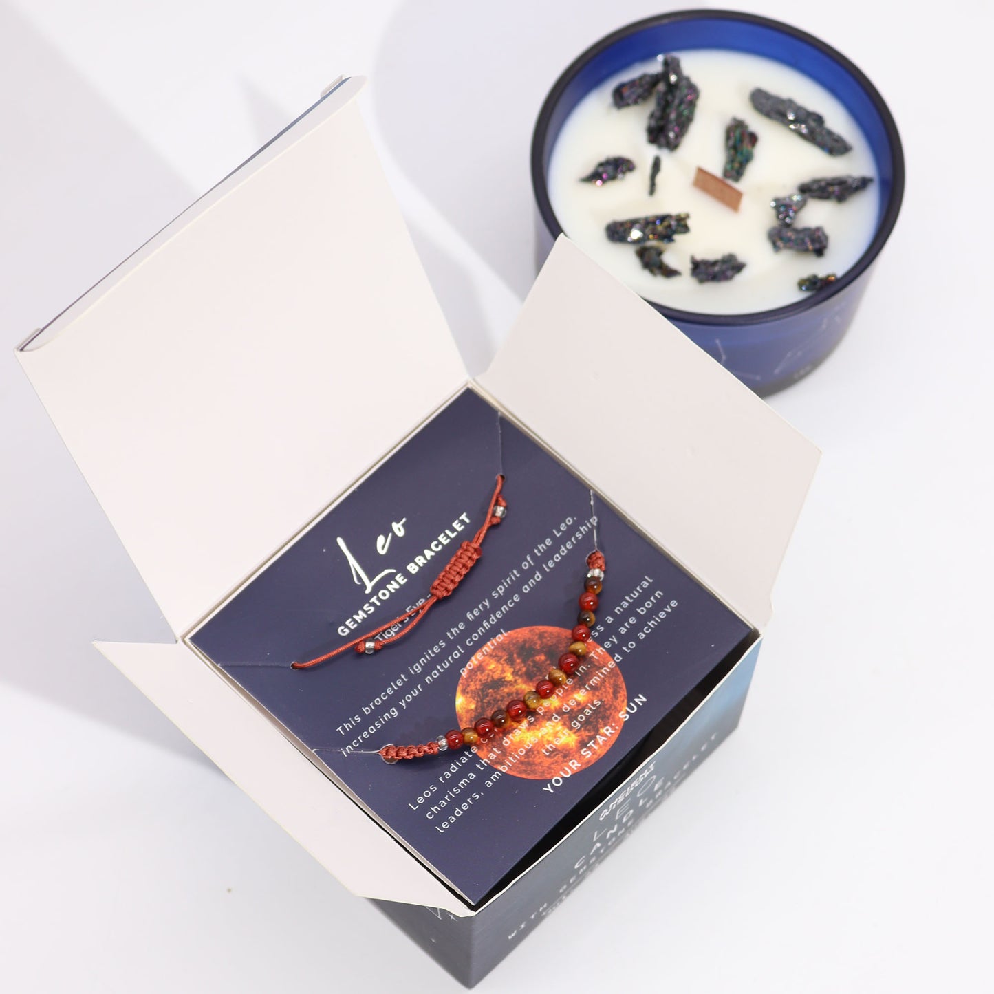 Leo Zodiac Crystal Candle with gemstone bracelet, midnight blue jar with constellation and fiery gemstone energy