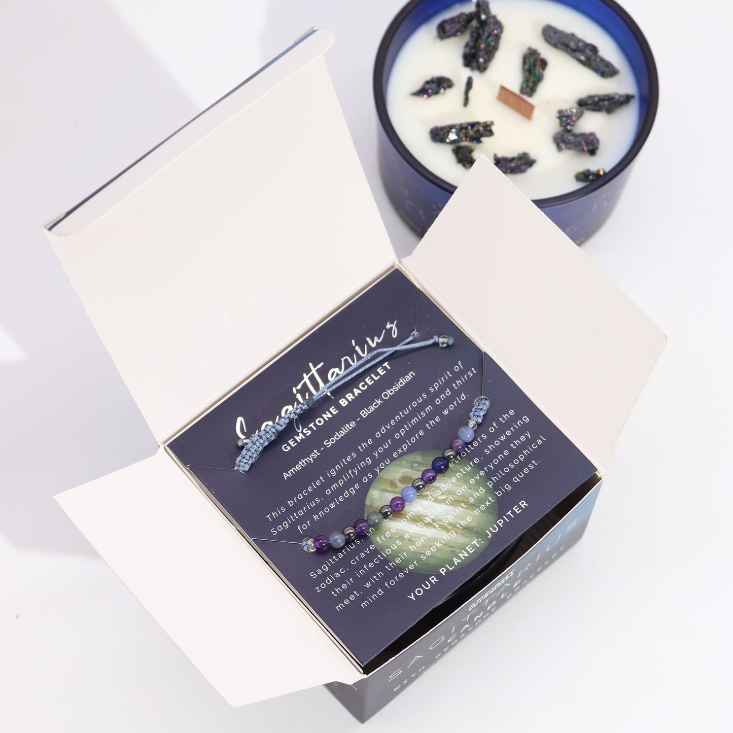 Sagittarius Zodiac Crystal Candle with gemstone bracelet, midnight blue jar with constellation and uplifting gemstone energy