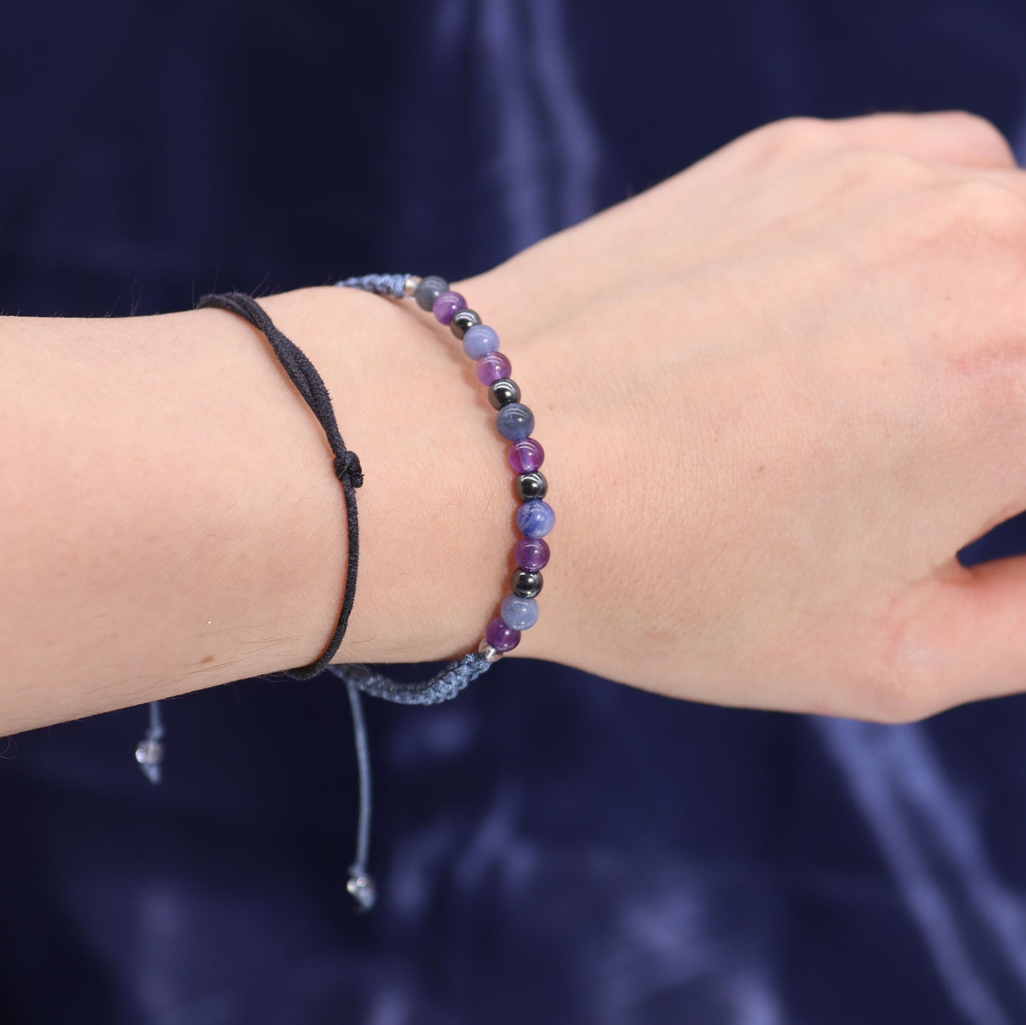 Sagittarius Zodiac Crystal Candle with gemstone bracelet, midnight blue jar with constellation and uplifting gemstone energy