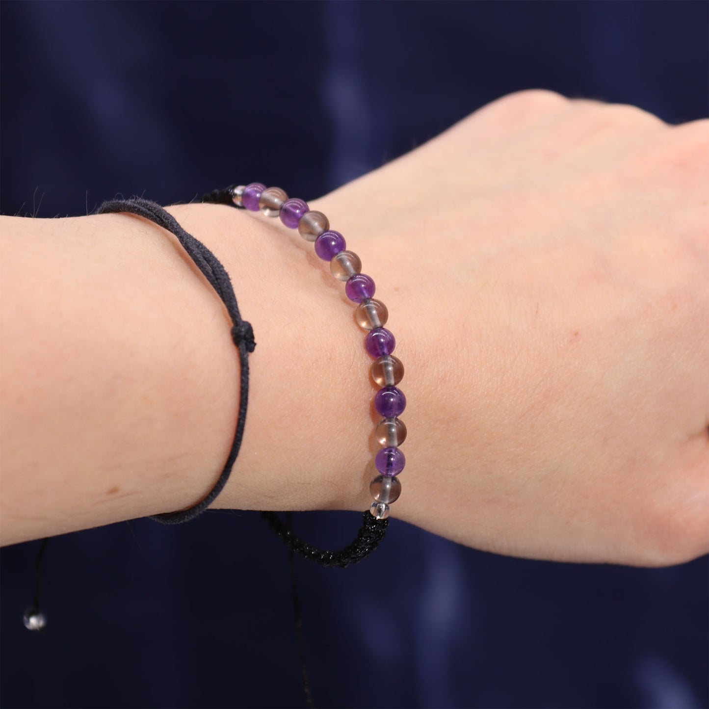Capricorn Zodiac Crystal Candle with gemstone bracelet, midnight blue jar with constellation and grounding crystal energy