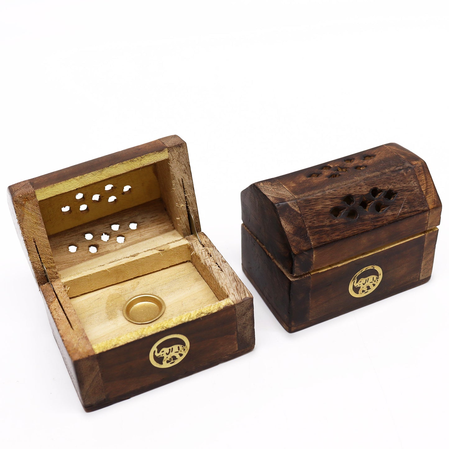 Mini mango wood incense cone box with brass elephant inlay and smoke vents. Ideal for compact spaces. Handcrafted and perfect for mindful moments.

