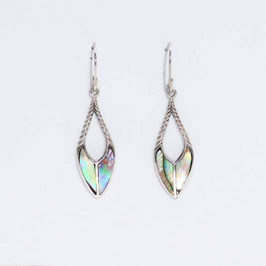 Close-up of 925 sterling silver and shell earrings crafted in Bali