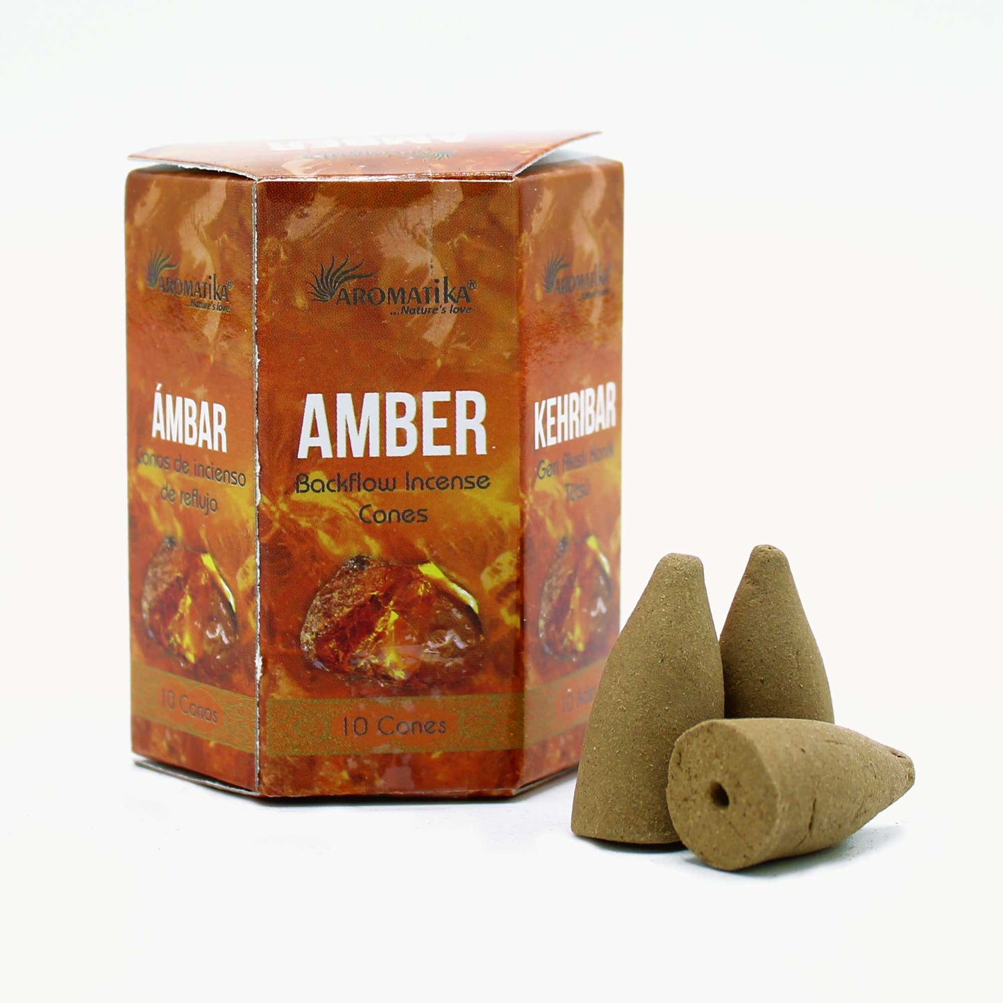 Aromatika Amber backflow incense cones in golden box with 10 warm, spicy-sweet cones for relaxation and rich sensory atmosphere.

