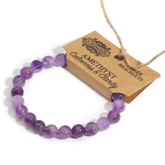 Amethyst power bracelet with soothing purple 8mm beads, symbolising calmness, mental clarity, and emotional balance.

