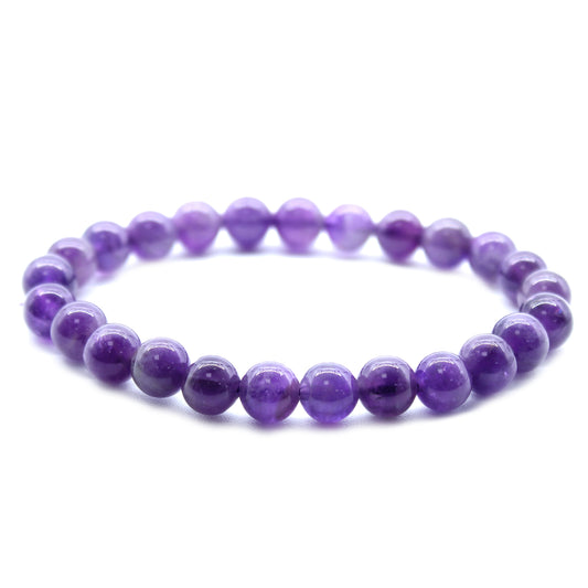 Amethyst power bracelet with soothing purple 8mm beads, symbolising calmness, mental clarity, and emotional balance.

