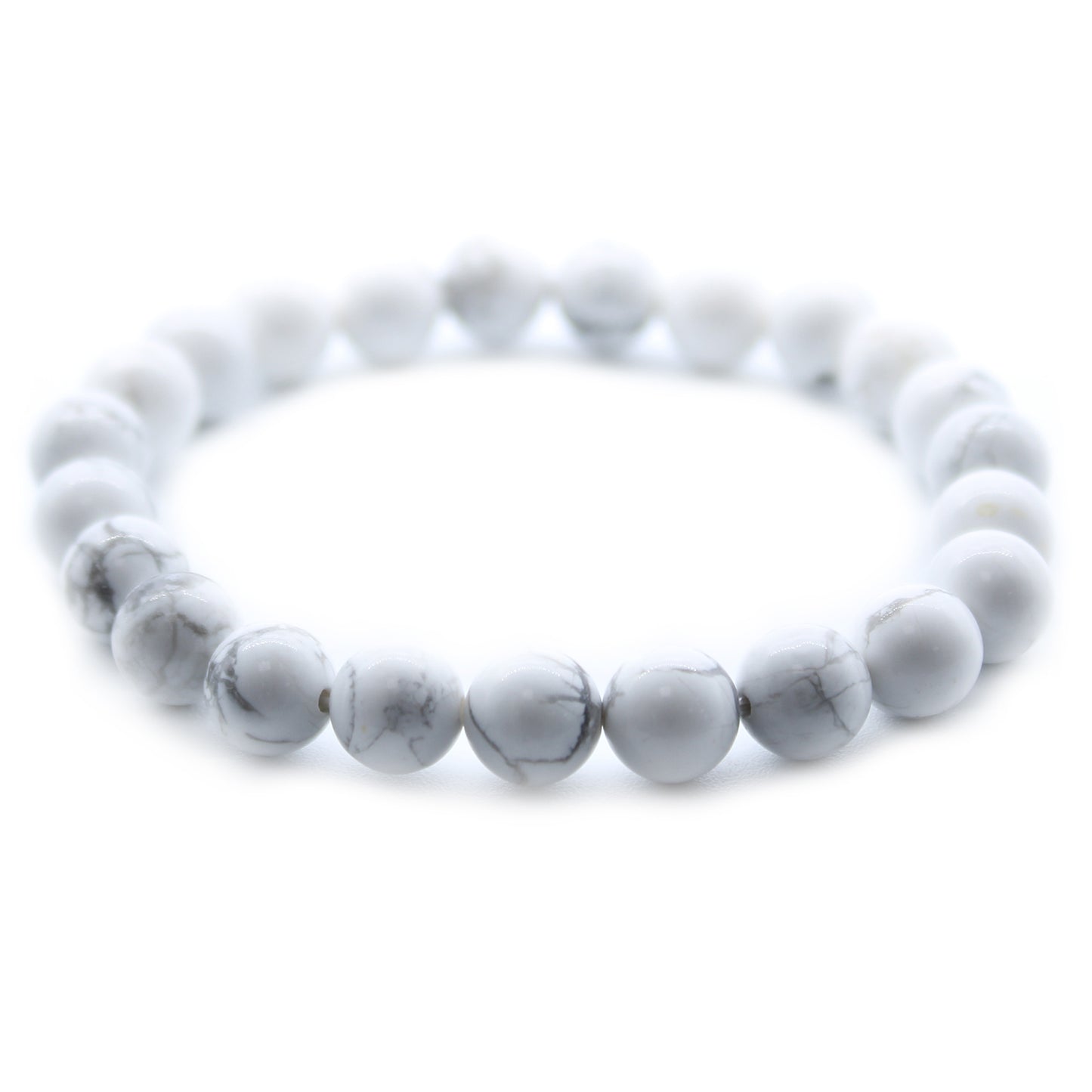White Jasper power bracelet for peace and friendship. 8mm soft-toned beads support calm, compassion, and emotional connection. One size fits all.

