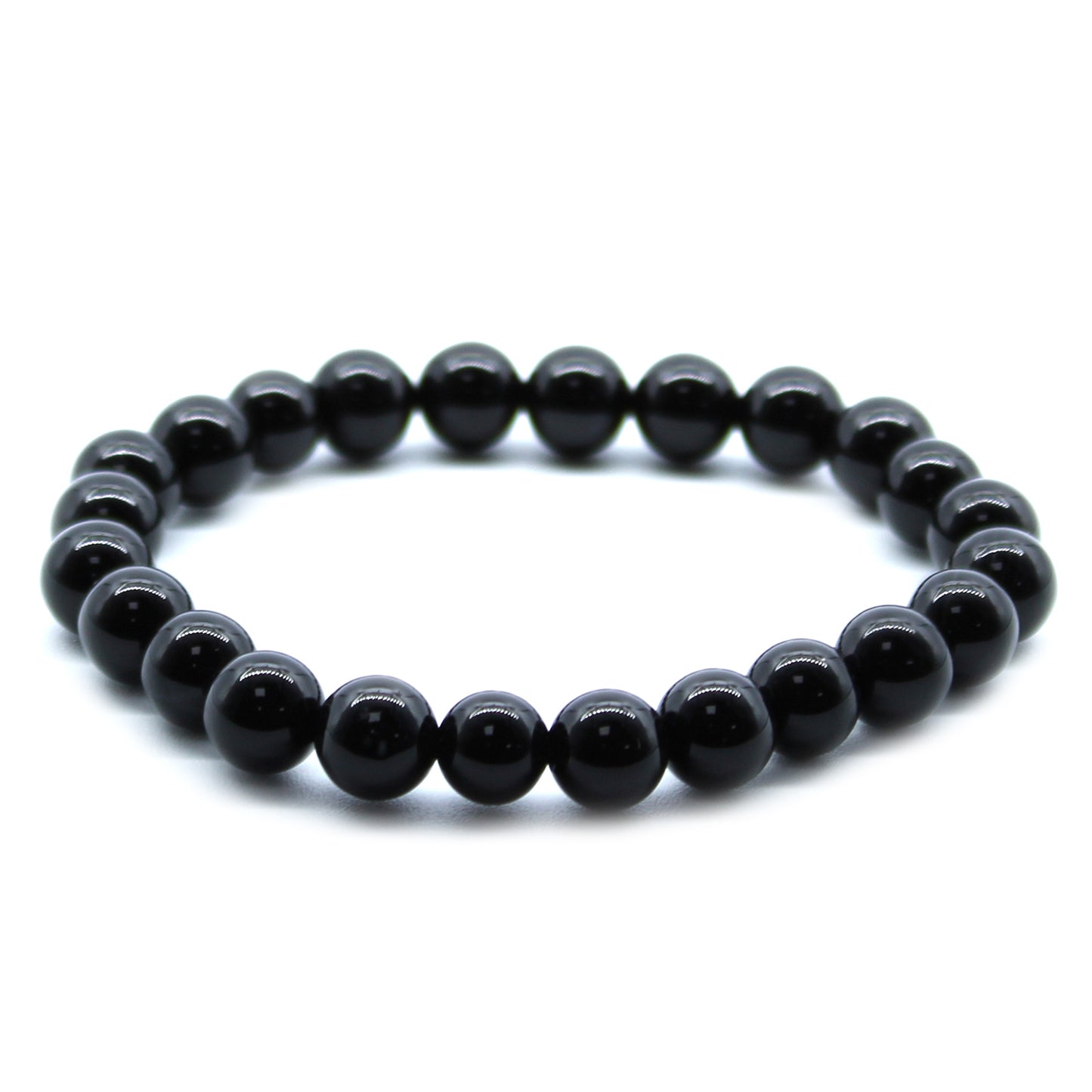 Black Agate power bracelet with smooth 8mm dark beads, symbolising strength, grounding, and protective energy.

