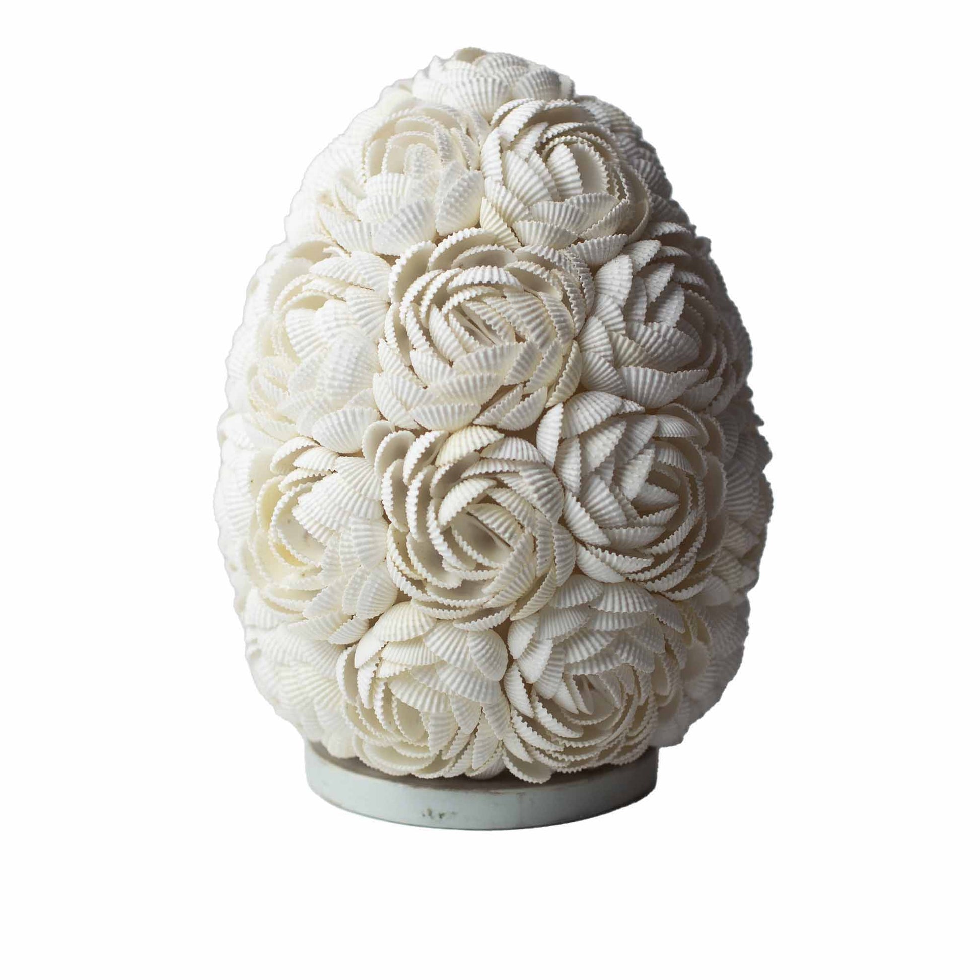 White seashell lamp in oval shape with rose petal design – 20cm, handcrafted in Indonesia, includes LED bulb for soft ambient lighting.

